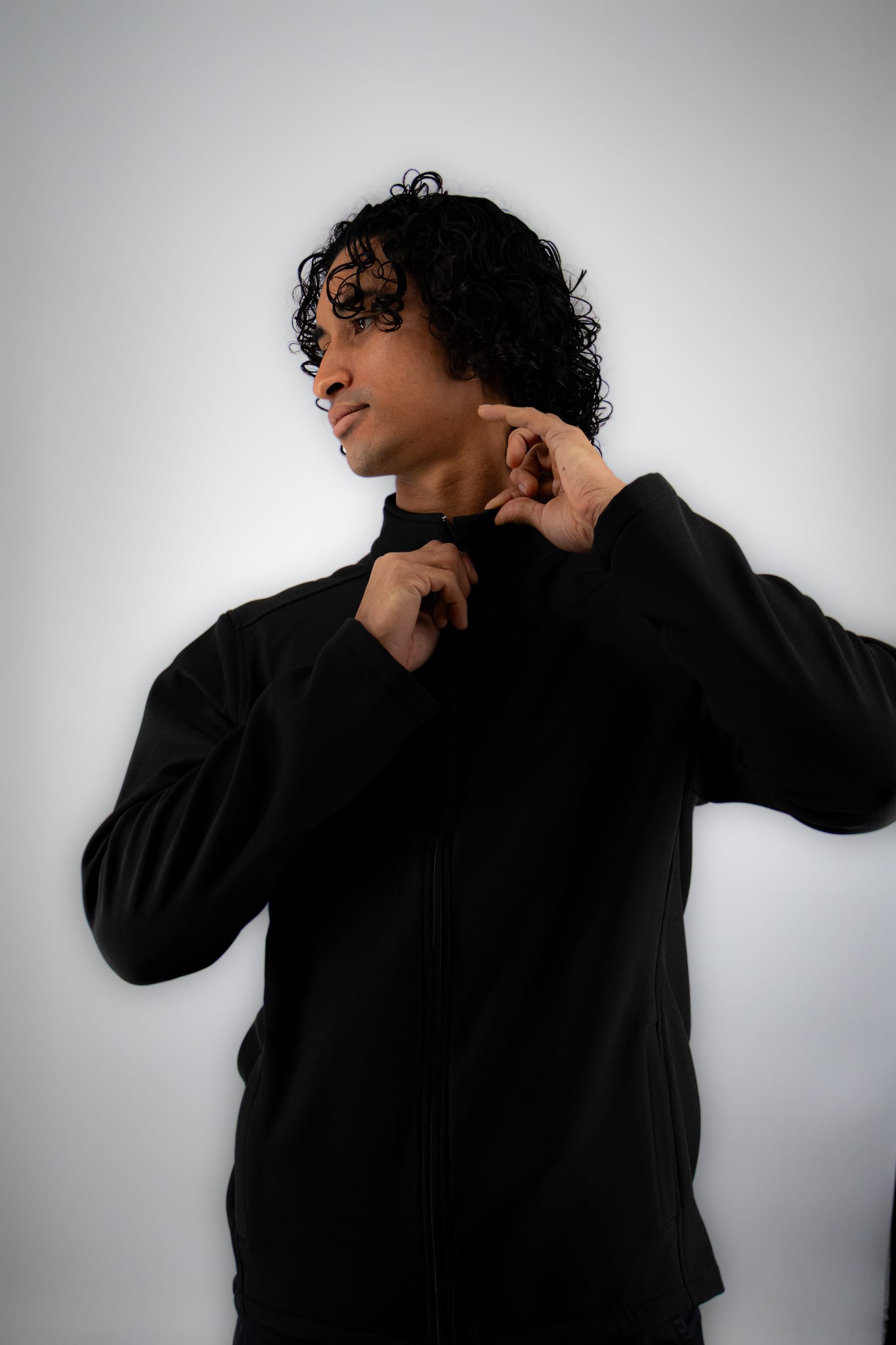 Man wearing the black WiZscrubs Comfort Jacket