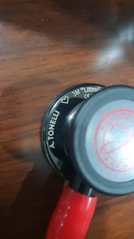 Black Littmann chestpiece engraved with a name followed by a heart icon