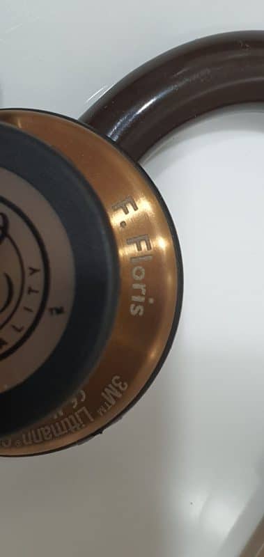 Close-up of an engraved name on a copper Littmann chestpiece
