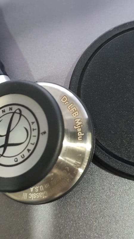 Stainless steel Littmann chestpiece engraved with a doctor's name in the Standard font
