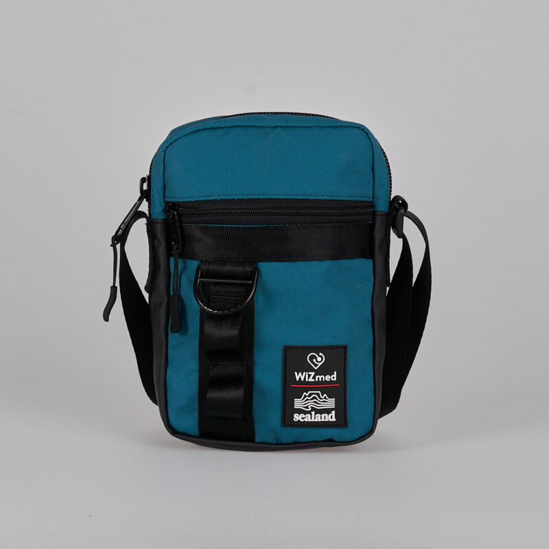 Sealand x WiZmed Ward Bag in teal and black, front view
