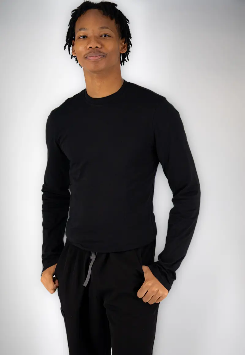 Men's long-sleeve underscrub in black, worn under scrubs
